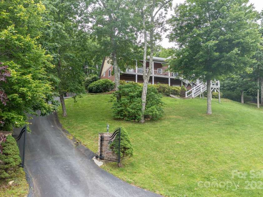 6 Grouse Terrace, Fairview, NC 28730.  MLS# CAR4269156, YatesRealty ID 19403. Gated entrance