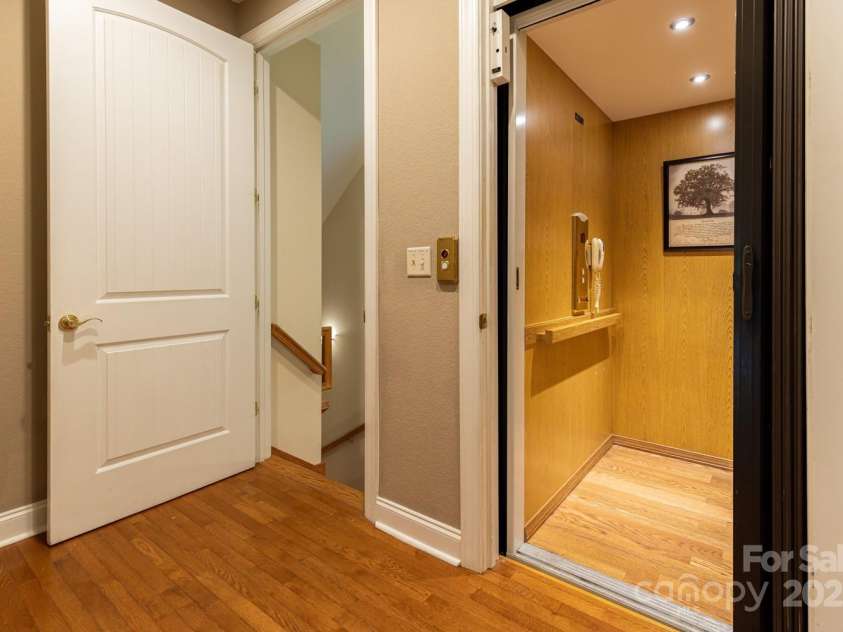 6 Grouse Terrace, Fairview, NC 28730.  MLS# CAR4269156, YatesRealty ID 19403. The elevator