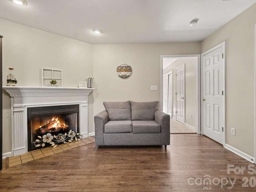 2240 15th Avenue, Hickory, NC 28601.  MLS# CAR4416073, YatesRealty ID 19404. Living Room Fireplace Virtually Enhanced