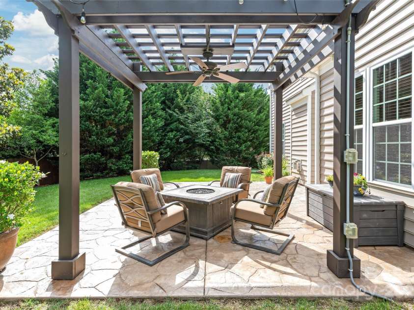 8115 Wilburn Court, Charlotte, NC 28277.  MLS# CAR4264288, YatesRealty ID 19412. Rear patio with pergola