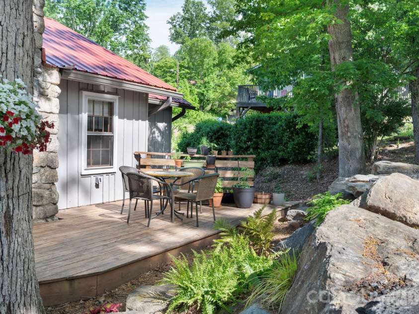126 Maney Avenue, Asheville, NC 28804.  MLS# CAR4377780, YatesRealty ID 19416. Landscaped boulder wall