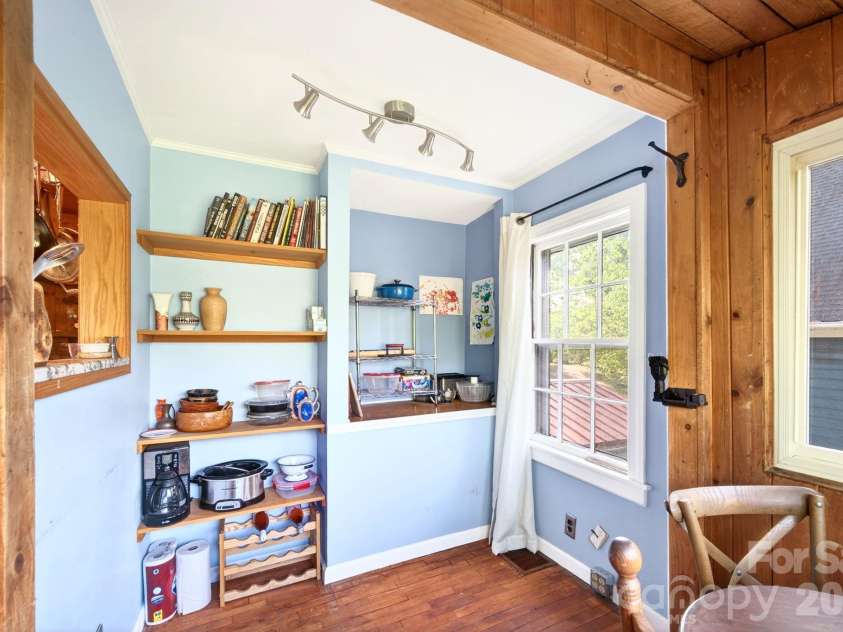 126 Maney Avenue, Asheville, NC 28804.  MLS# CAR4377780, YatesRealty ID 19416. Storage in breakfast nook
