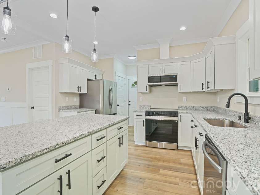 319 Grice Street, Shelby, NC 28150.  MLS# CAR4377750, YatesRealty ID 19419. Kitchen/Side Door 
