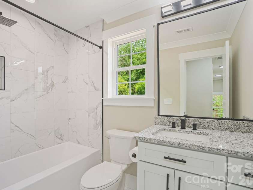 319 Grice Street, Shelby, NC 28150.  MLS# CAR4377750, YatesRealty ID 19419. Upstairs Full Bath Room 