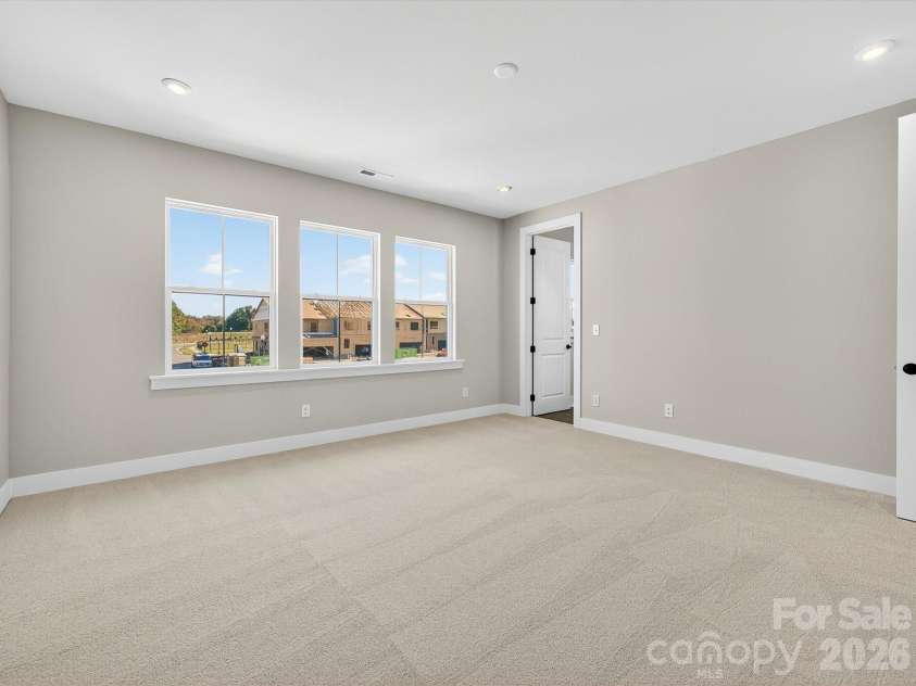 325 Ardmore Drive, Belmont, NC 28012.  MLS# CAR4378189, YatesRealty ID 19425. Light filled primary bedroom