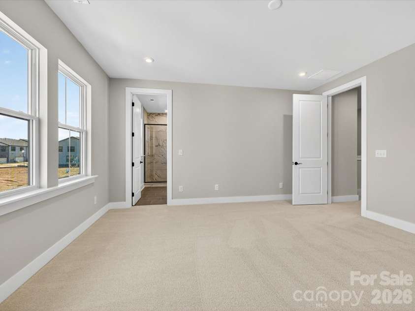 325 Ardmore Drive, Belmont, NC 28012.  MLS# CAR4378189, YatesRealty ID 19425. Light filled primary bedroom