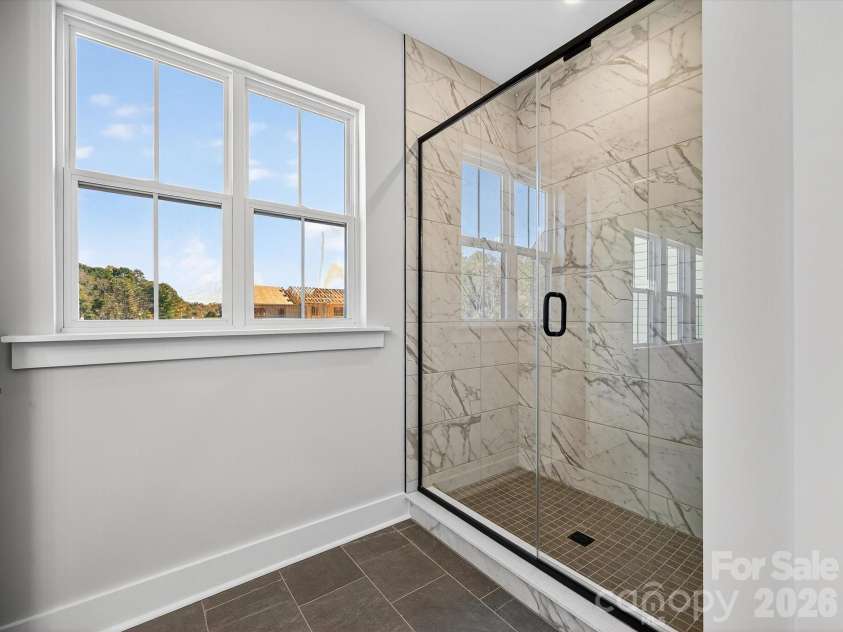 325 Ardmore Drive, Belmont, NC 28012.  MLS# CAR4378189, YatesRealty ID 19425. Tiled primary walk-in shower