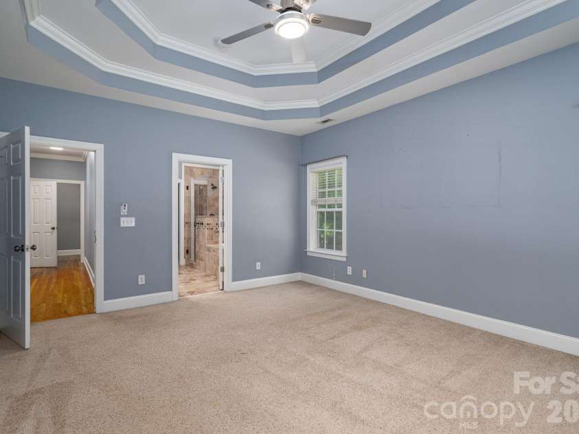 122 Maple View Drive, Troutman, NC 28166.  MLS# CAR4378569, YatesRealty ID 19426. Primary bedroom
