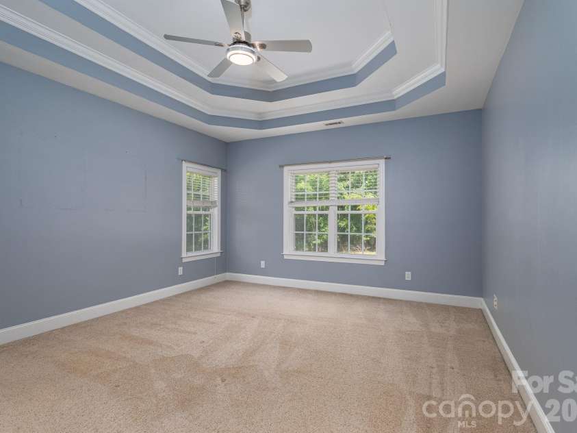 122 Maple View Drive, Troutman, NC 28166.  MLS# CAR4378569, YatesRealty ID 19426. Primary bedroom