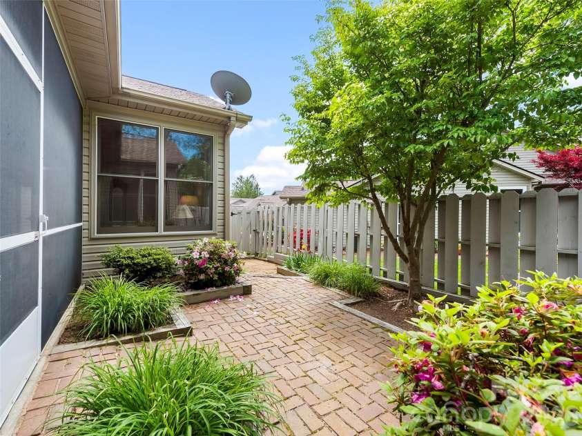 29 Tisha Lane, Hendersonville, NC 28739.  MLS# CAR4378450, YatesRealty ID 19429. Bricked Courtyard