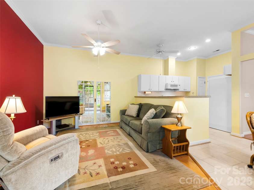 29 Tisha Lane, Hendersonville, NC 28739.  MLS# CAR4378450, YatesRealty ID 19429. Den off Kitchen