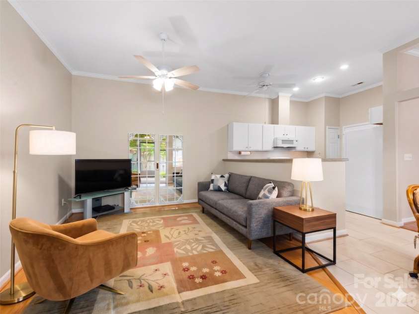 29 Tisha Lane, Hendersonville, NC 28739.  MLS# CAR4378450, YatesRealty ID 19429. Virtually Staged Den off Kitchen