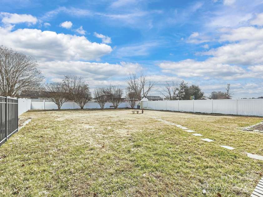 4562 Lanstone Court, Concord, NC 28027.  MLS# CAR4328877, YatesRealty ID 19431. Big Level Backyard 