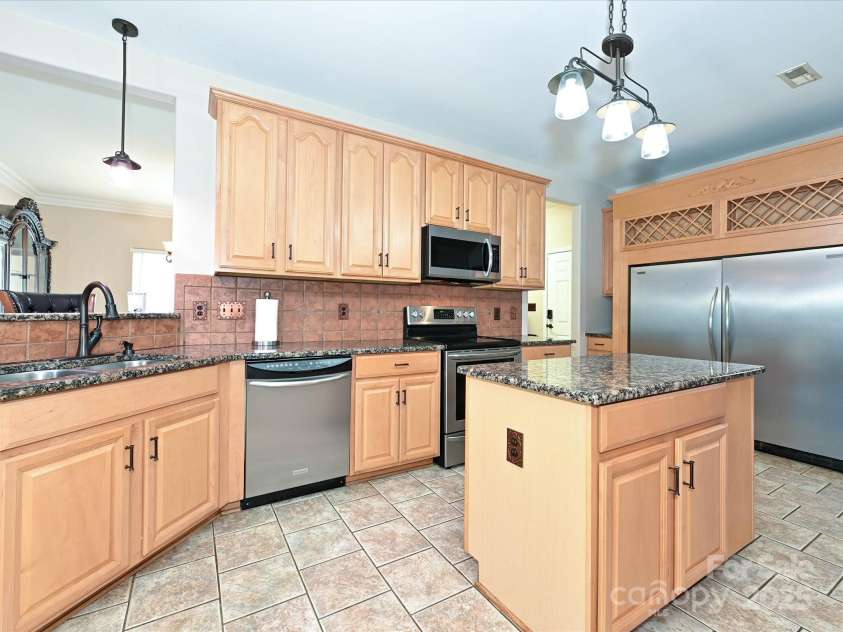 4562 Lanstone Court, Concord, NC 28027.  MLS# CAR4328877, YatesRealty ID 19431. Gourmet Kitchen