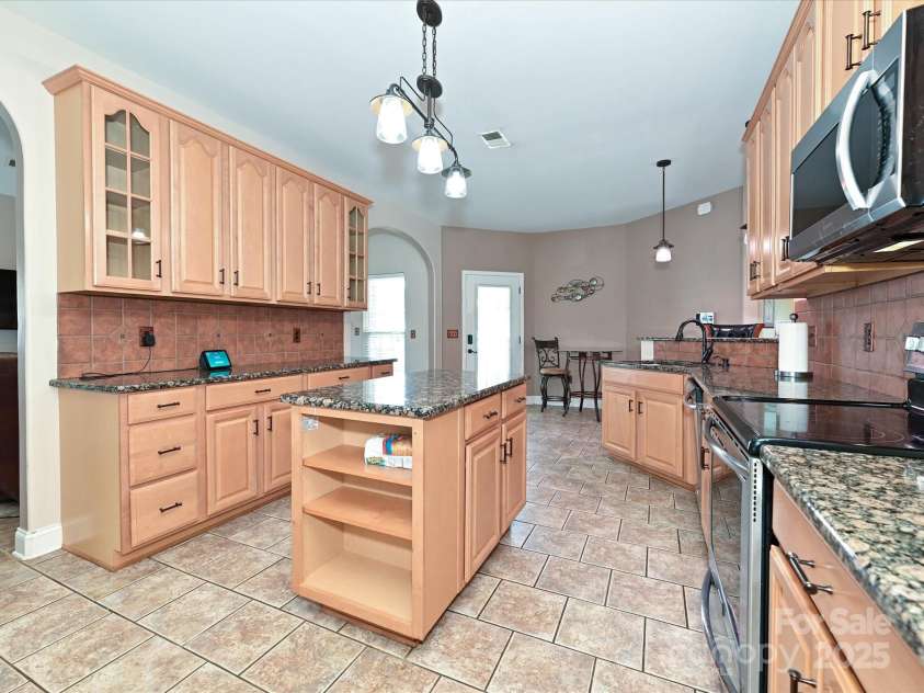 4562 Lanstone Court, Concord, NC 28027.  MLS# CAR4328877, YatesRealty ID 19431. Gourmet Kitchen