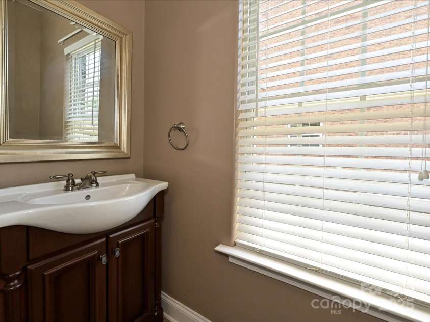 4562 Lanstone Court, Concord, NC 28027.  MLS# CAR4328877, YatesRealty ID 19431. Powder Room 