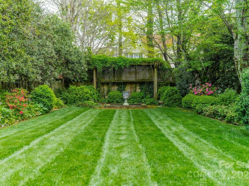 1919 Kensal Court, Charlotte, NC 28211.  MLS# CAR4193792, YatesRealty ID 19433. Incredible curated landscaping
