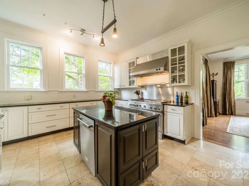 1919 Kensal Court, Charlotte, NC 28211.  MLS# CAR4193792, YatesRealty ID 19433. Kitchen with island and 2 dishwashers!