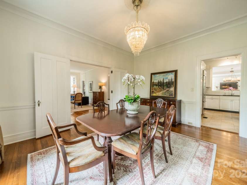 1919 Kensal Court, Charlotte, NC 28211.  MLS# CAR4193792, YatesRealty ID 19433. The Formal Dining Room connects directly to the kitchen on the right and to the Living Room.