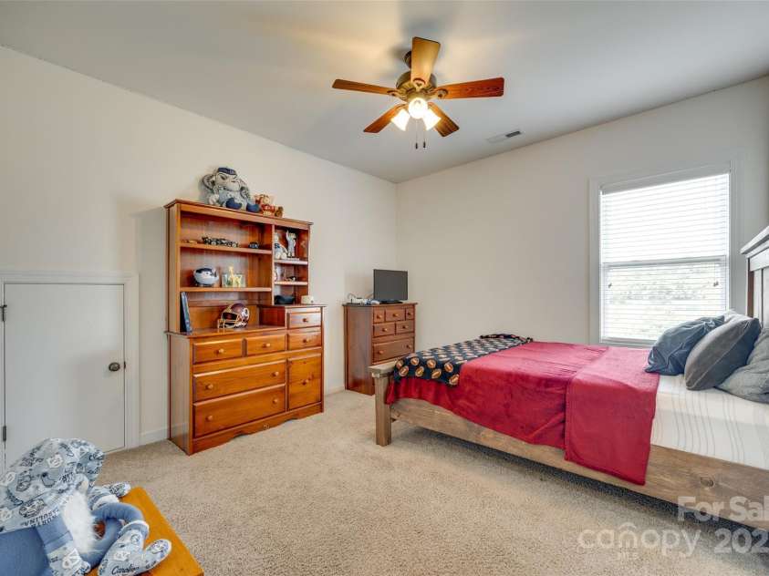 308 Hollister Estates Drive, Waxhaw, NC 28173.  MLS# CAR4254412, YatesRealty ID 19438. Upstairs Bedroom 2