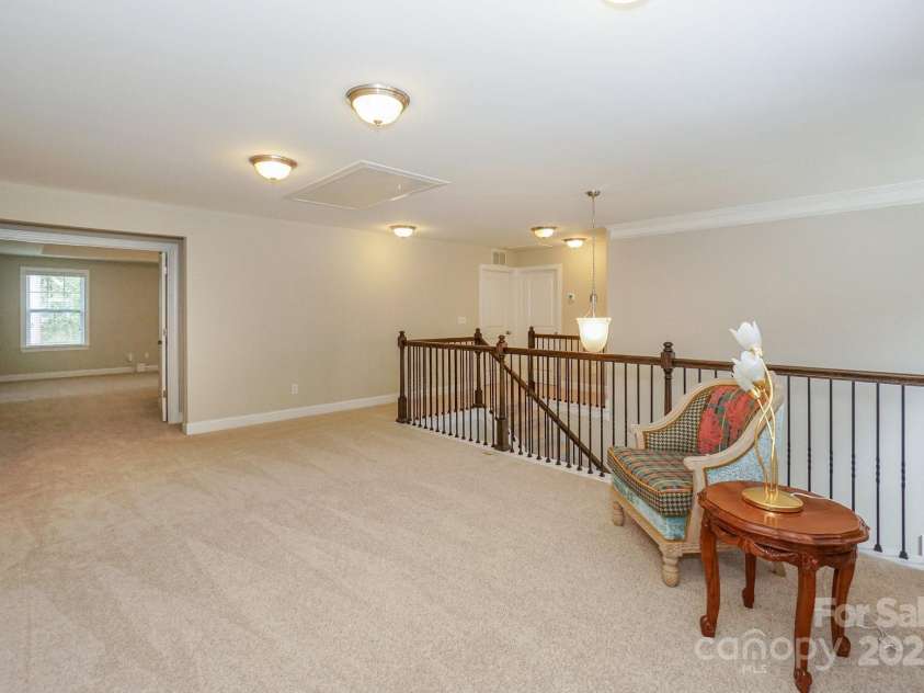135 Canoe Pole Lane, Mooresville, NC 28117.  MLS# CAR4254258, YatesRealty ID 19439. Large Loft