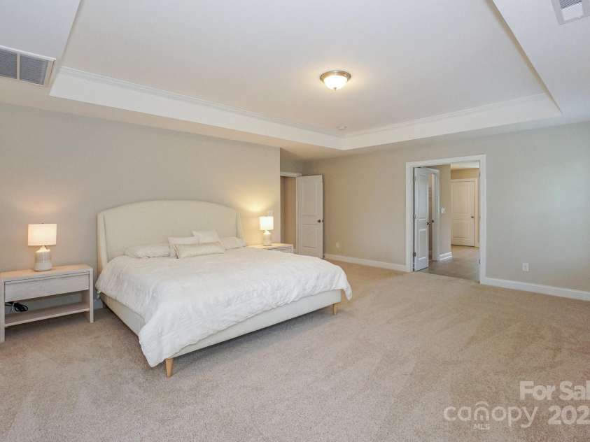 135 Canoe Pole Lane, Mooresville, NC 28117.  MLS# CAR4254258, YatesRealty ID 19439. Primary Bedroom
