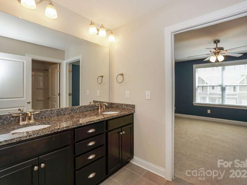 135 Canoe Pole Lane, Mooresville, NC 28117.  MLS# CAR4254258, YatesRealty ID 19439. Shared Adjoining Bath