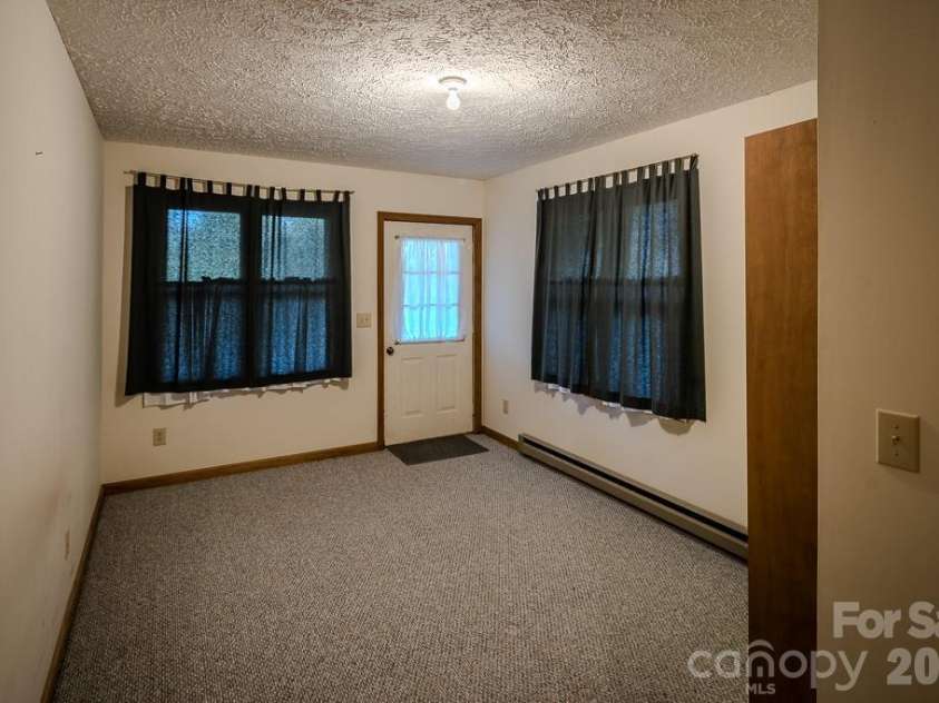 86 Hickory Lane, Newland, NC 28657.  MLS# CAR4378825, YatesRealty ID 19439. Basement bedroom