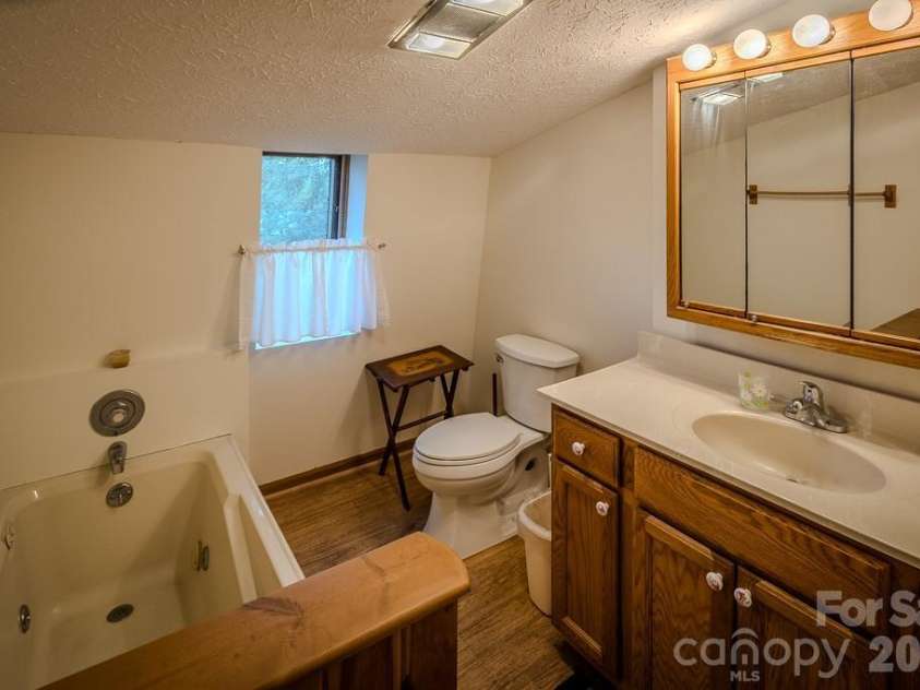 86 Hickory Lane, Newland, NC 28657.  MLS# CAR4378825, YatesRealty ID 19439. Full bath upstairs