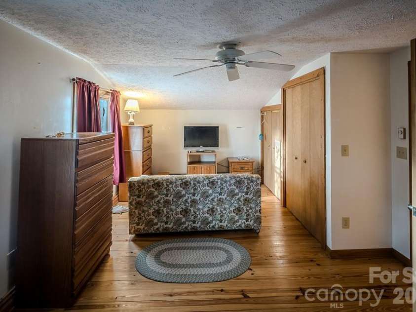 86 Hickory Lane, Newland, NC 28657.  MLS# CAR4378825, YatesRealty ID 19439. Large bedroom with ample closet space