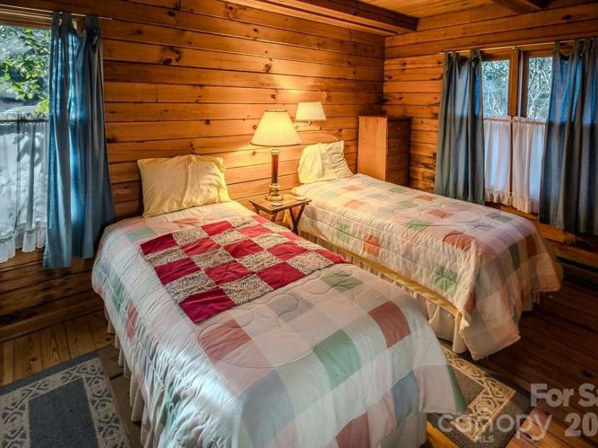 86 Hickory Lane, Newland, NC 28657.  MLS# CAR4378825, YatesRealty ID 19439. Primary bedroom on main floor