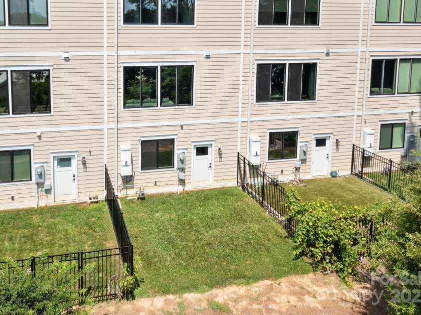 919 Cityscape Drive, Charlotte, NC 28205.  MLS# CAR4263066, YatesRealty ID 19441. Fencing has been completed