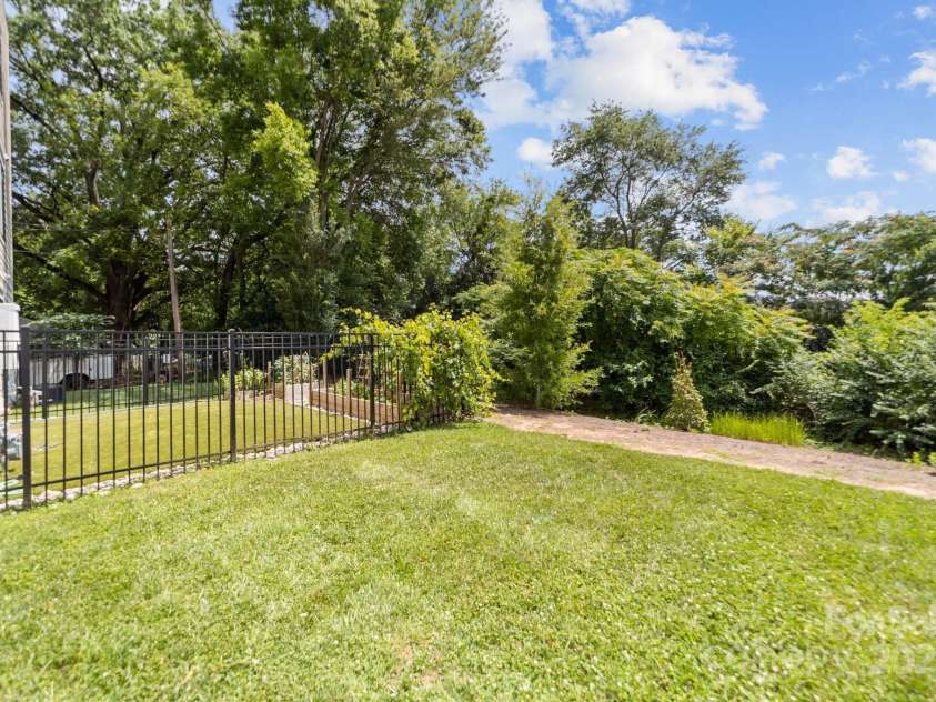 919 Cityscape Drive, Charlotte, NC 28205.  MLS# CAR4263066, YatesRealty ID 19441. Rear fencing has been completed