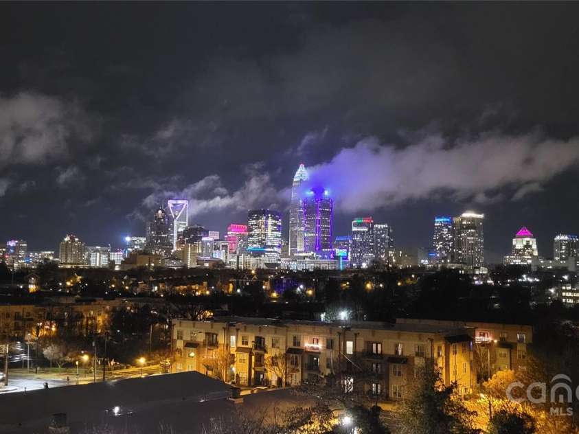 919 Cityscape Drive, Charlotte, NC 28205.  MLS# CAR4263066, YatesRealty ID 19441. Uptown skyline at night