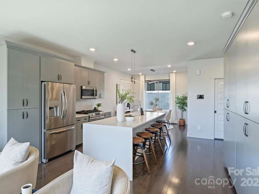 919 Cityscape Drive, Charlotte, NC 28205.  MLS# CAR4313409, YatesRealty ID 19441. Waterfall island!