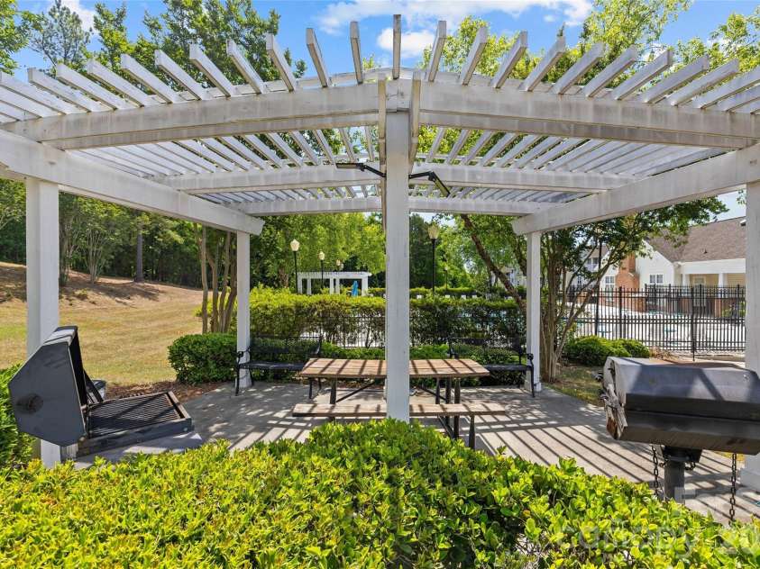10652 Hill Point Court, Charlotte, NC 28262.  MLS# CAR4378290, YatesRealty ID 19443. Grilling area and picnic table
