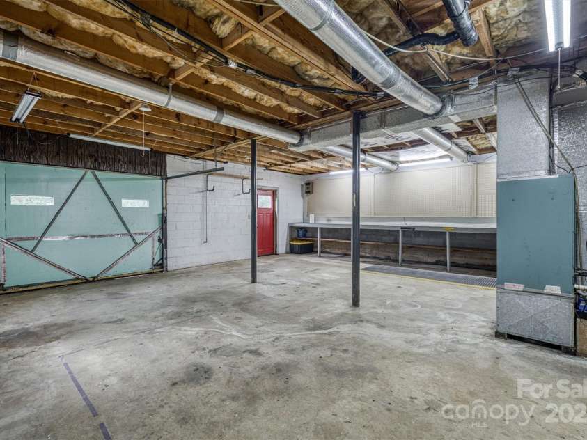 2653 Fairway Acres Circle, Lenoir, NC 28645.  MLS# CAR4264912, YatesRealty ID 19443. Basement Garage & Workshop