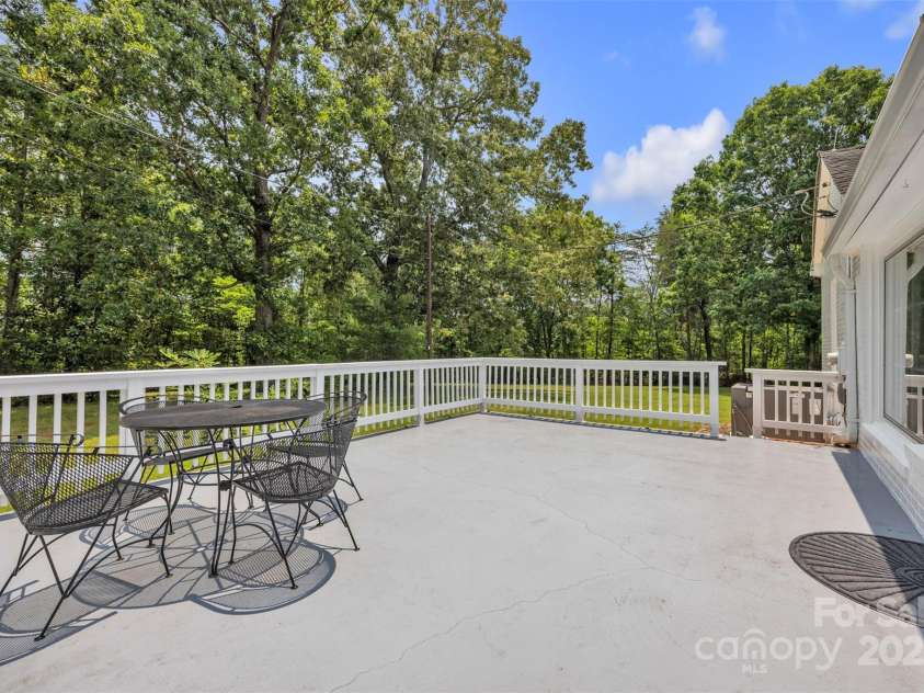 3804 Lippard Lane, Valdese, NC 28690.  MLS# CAR4266483, YatesRealty ID 19444. Back concrete patio