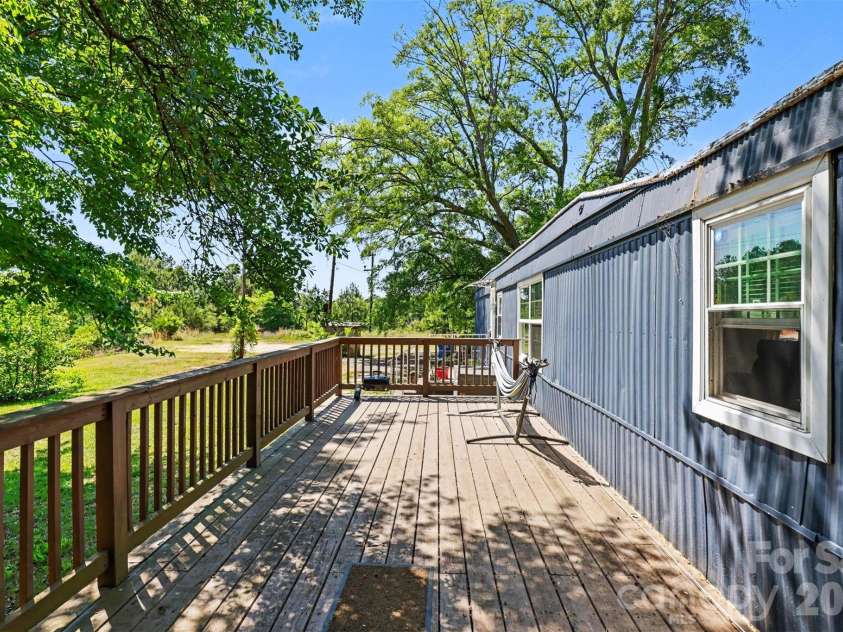 9937 Harwood Lane, Charlotte, NC 28214.  MLS# CAR4378200, YatesRealty ID 19445. Back deck