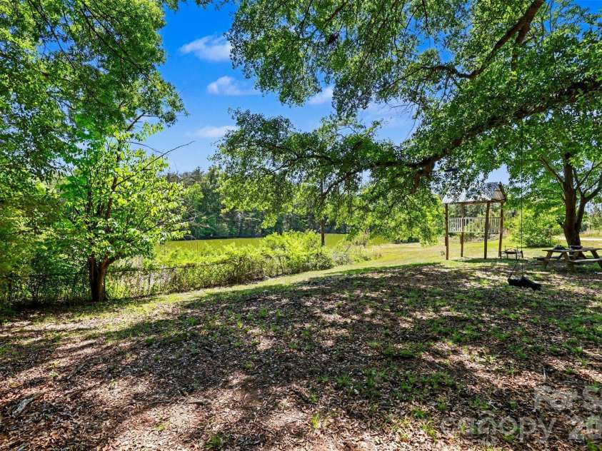 9937 Harwood Lane, Charlotte, NC 28214.  MLS# CAR4378200, YatesRealty ID 19445. Back yard
