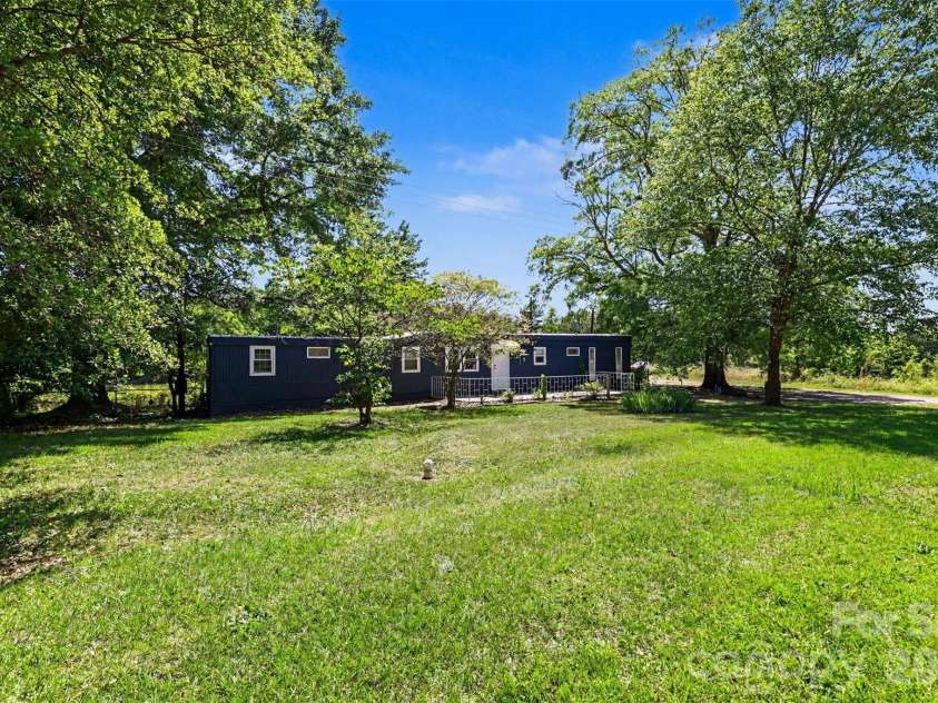9937 Harwood Lane, Charlotte, NC 28214.  MLS# CAR4378200, YatesRealty ID 19445. Front yard
