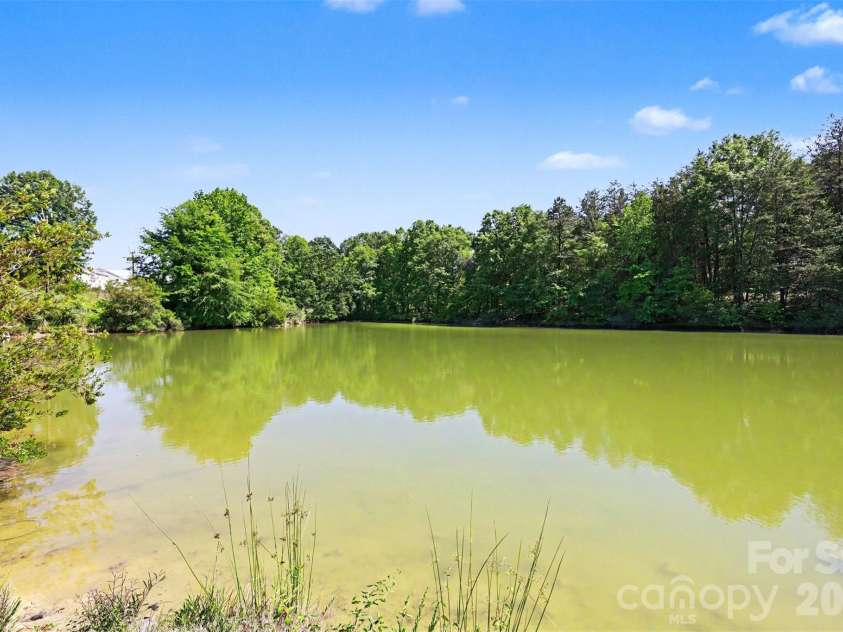 9937 Harwood Lane, Charlotte, NC 28214.  MLS# CAR4378200, YatesRealty ID 19445. Lake view