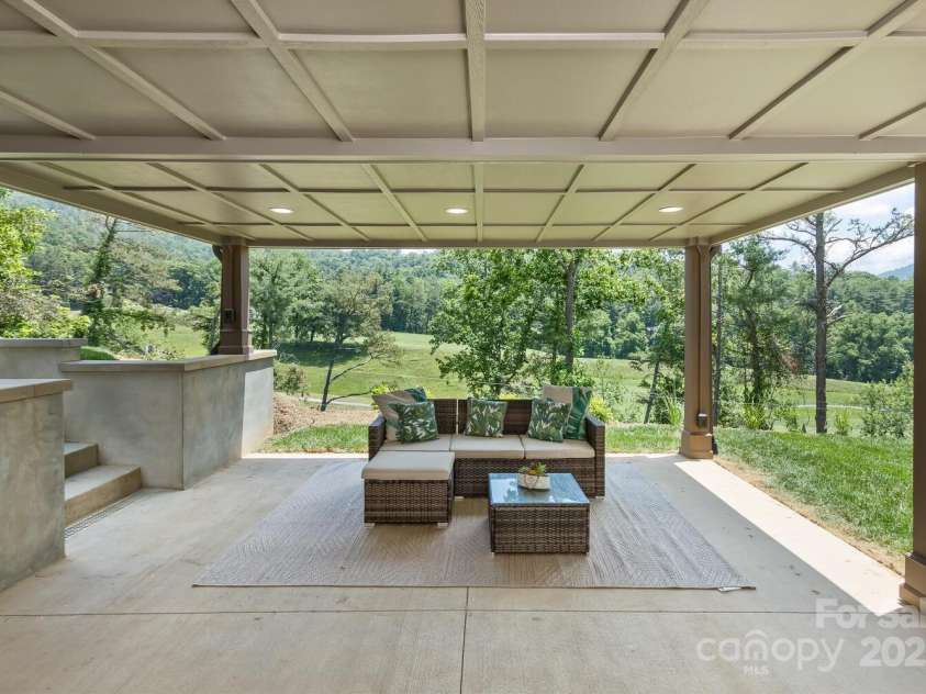 41 Robinhood Road, Asheville, NC 28804.  MLS# CAR4269565, YatesRealty ID 19447. LOWER PATIO