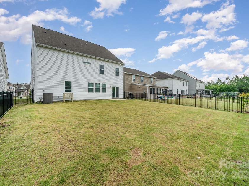 16200 Winfield Hall Drive, Charlotte, NC 28273.  MLS# CAR4237353, YatesRealty ID 19449. Backyard