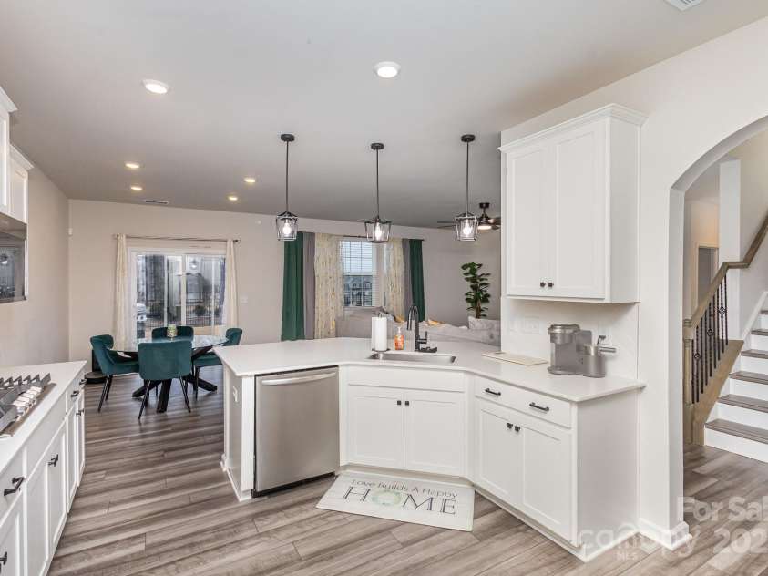 16200 Winfield Hall Drive, Charlotte, NC 28273.  MLS# CAR4237353, YatesRealty ID 19449. Kitchen View w/ Stair Case