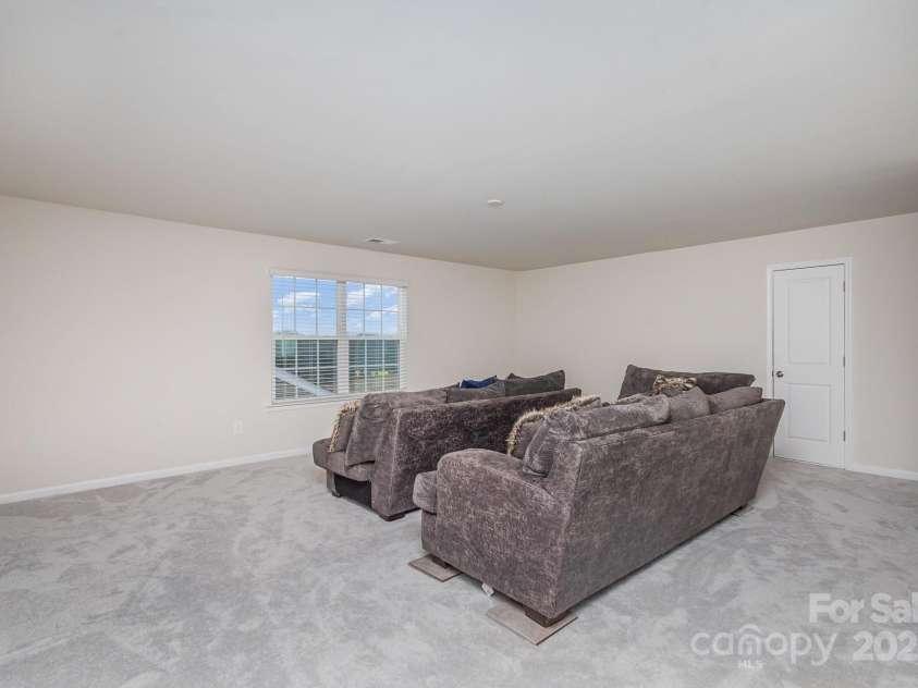 16200 Winfield Hall Drive, Charlotte, NC 28273.  MLS# CAR4237353, YatesRealty ID 19449. Loft Area w/Storage Space