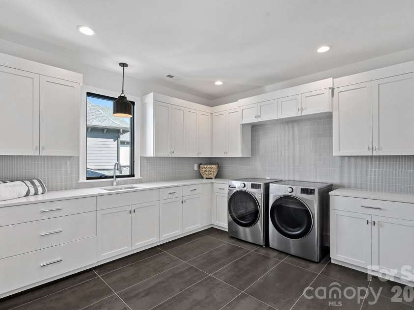 17811 Largo Place, Cornelius, NC 28031.  MLS# CAR4428601, YatesRealty ID 1945. Upper- Level Laundry Room
