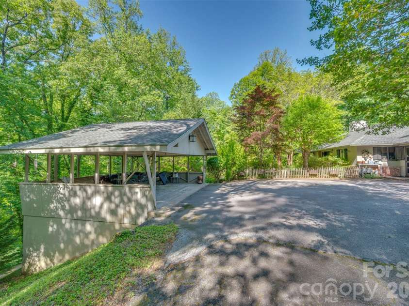 484 Sourwood Ridge Road, Tryon, NC 28782.  MLS# CAR4379103, YatesRealty ID 19452. 