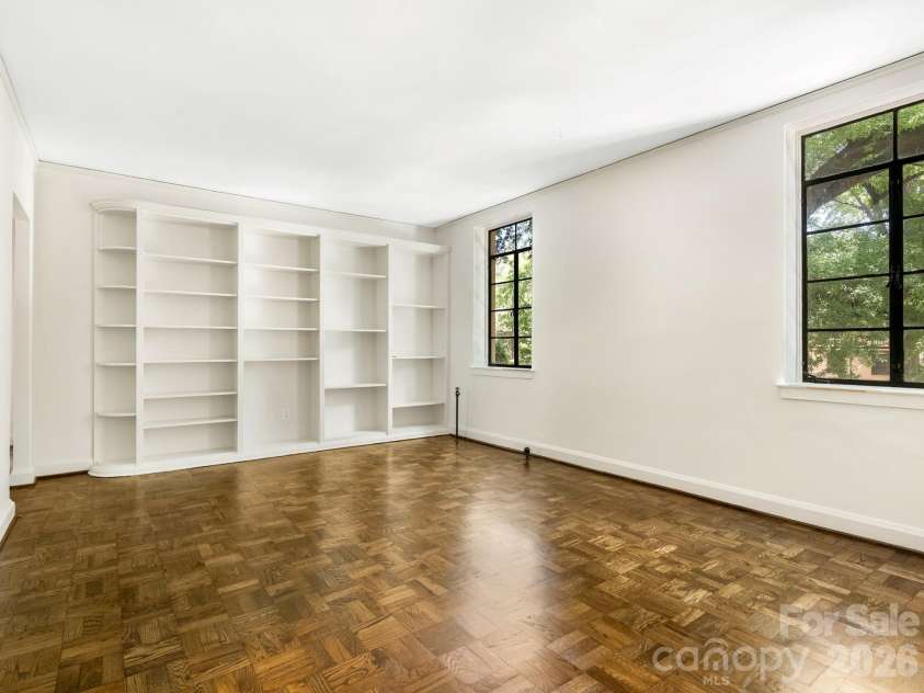 1121 Myrtle Avenue, Charlotte, NC 28203.  MLS# CAR4384063, YatesRealty ID 19454. Shelves in Living Room