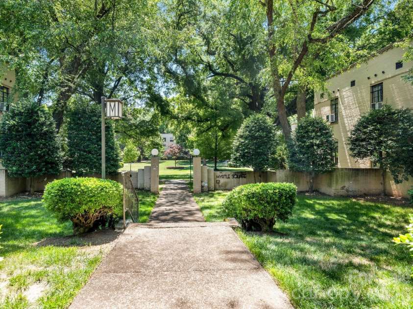 1121 Myrtle Avenue, Charlotte, NC 28203.  MLS# CAR4384063, YatesRealty ID 19454. Walkway to unit
